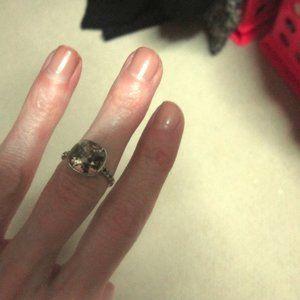 Swarovski Crystals & Sterling Ring. Brown center crystal, dark side crystals.